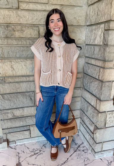 Textured beige vertical stripe sweater vest round neckline large gold buttons front patch pockets boxy fit