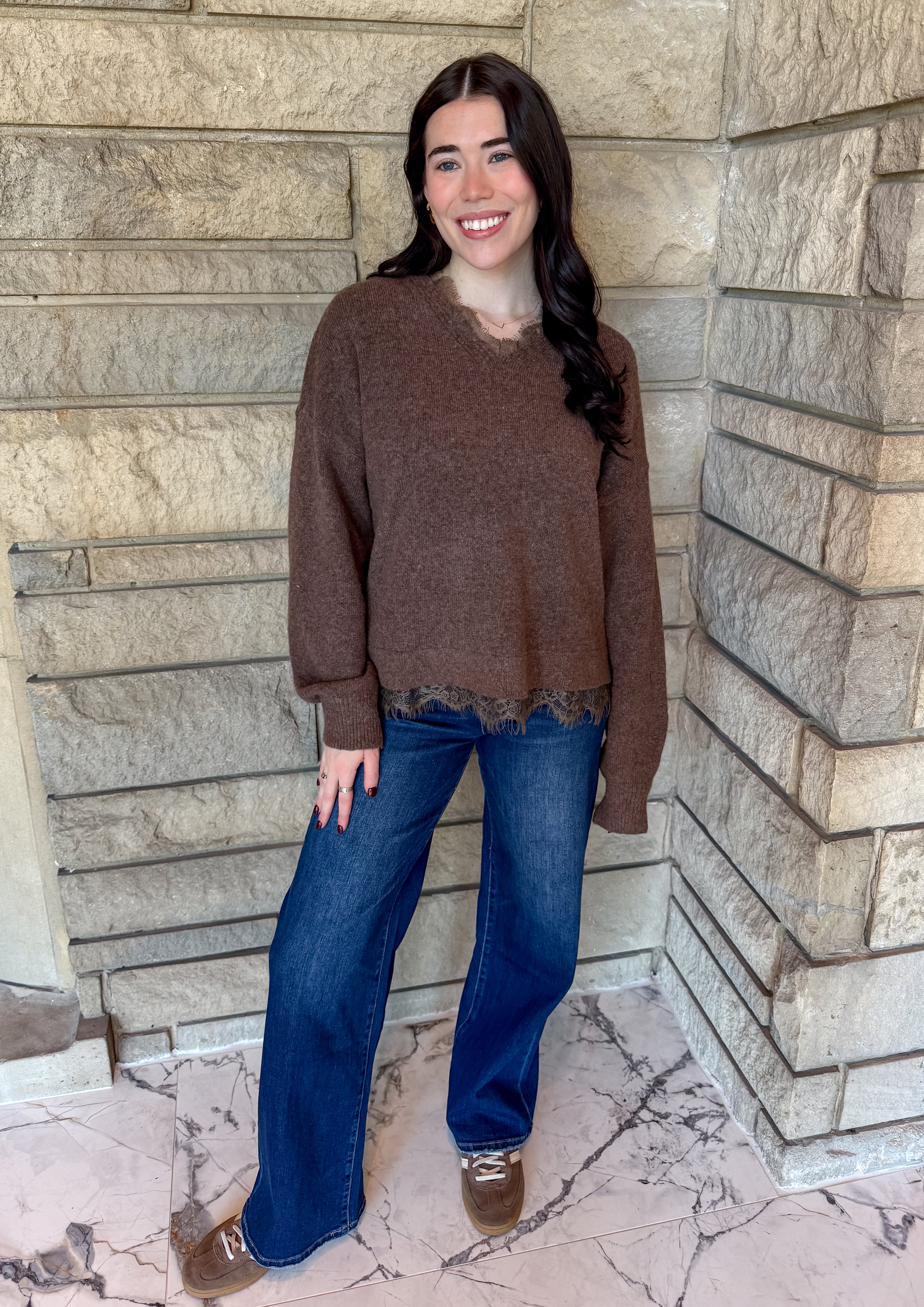 Brown v neck sweater with delicate lace trim at the neckline and hem, long sleeves