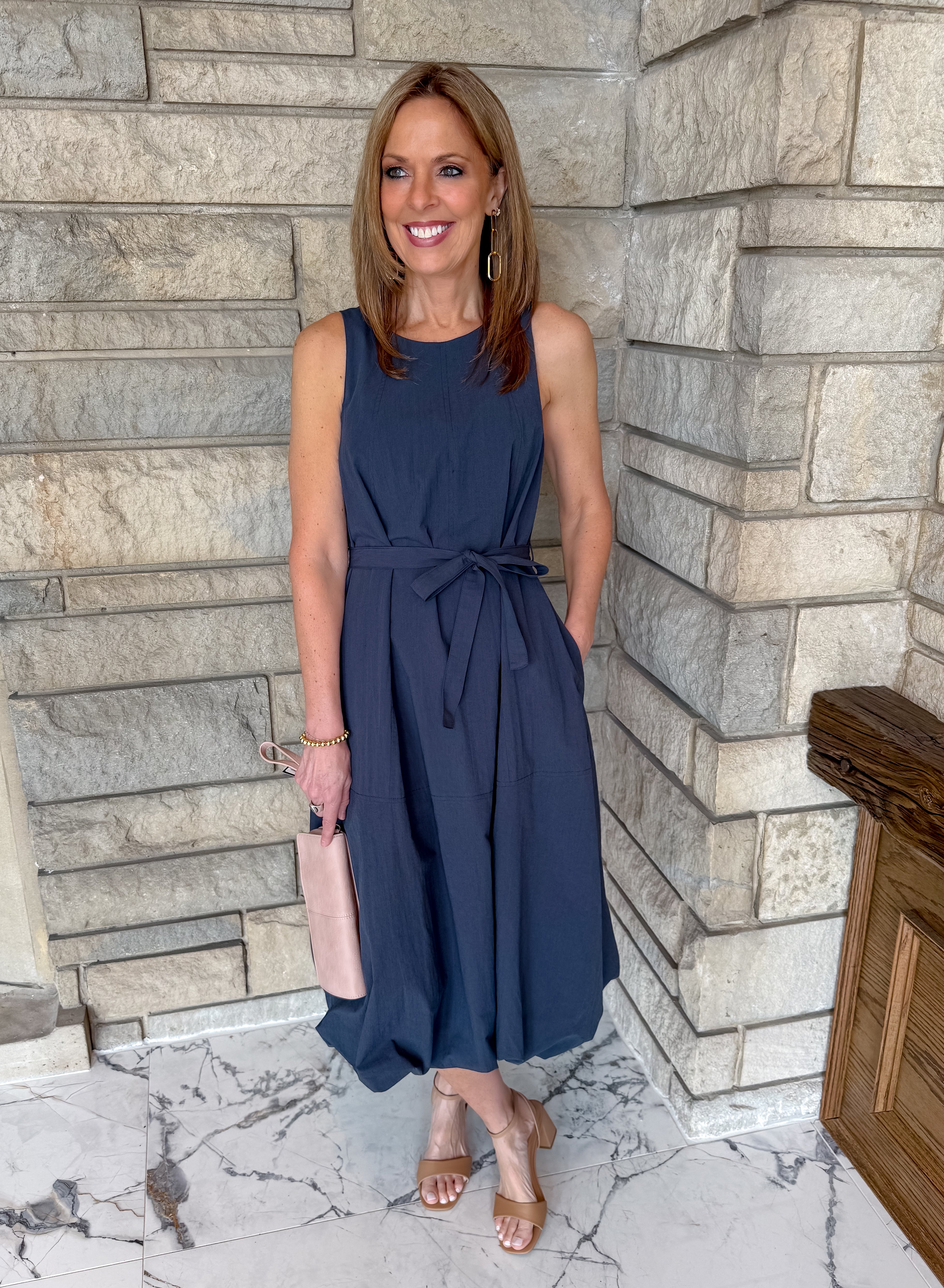 Sleeveless navy midi dress with tie belt. Bubble midi dress.