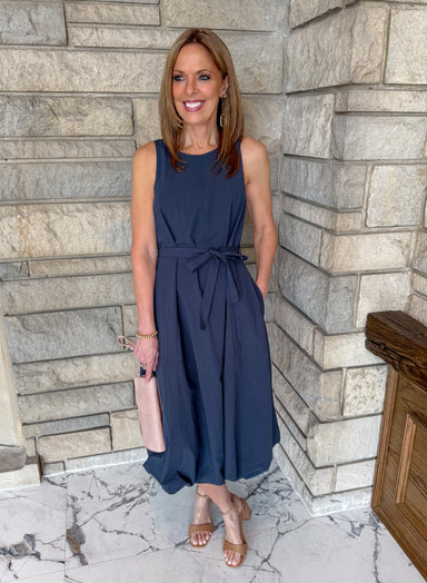 Sleeveless navy midi dress with tie belt. Bubble midi dress.