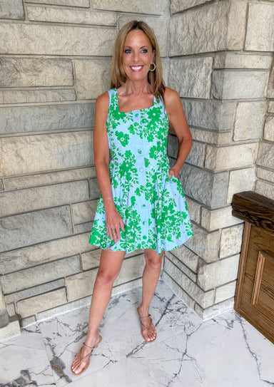 Light blue dress with kelly green floral print and embroidery
button front square neck sleeveless dress
fit and flare skirt