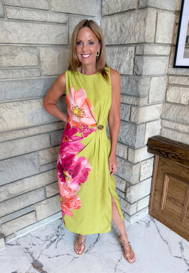 Bold flower print
Chartreuse dress with hot pink flowers on side
side ruched midi dress with gold button