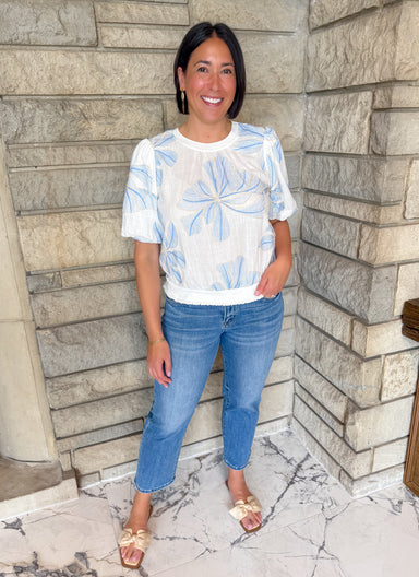 White bubble sleeve top
Blue embroidered flowers
elastic banded hem