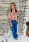 Mixed print top 
ruffle neckline
pearl buttons
contrast trim neck and cuffs