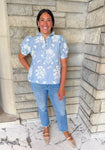 light blue blouse with cream embroidery
button top with ruffle collar