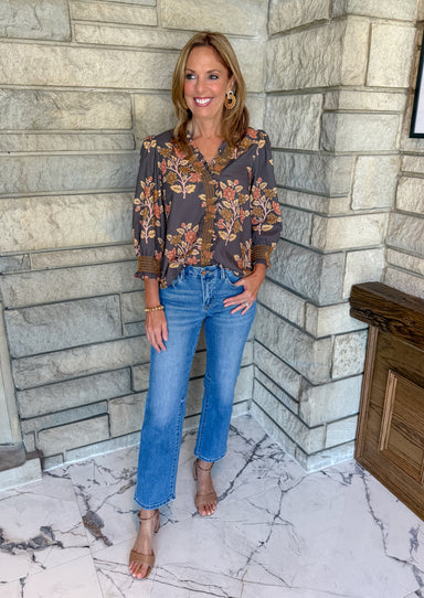 Mocha blouse with browns and tans flower print smocked ruffle trim