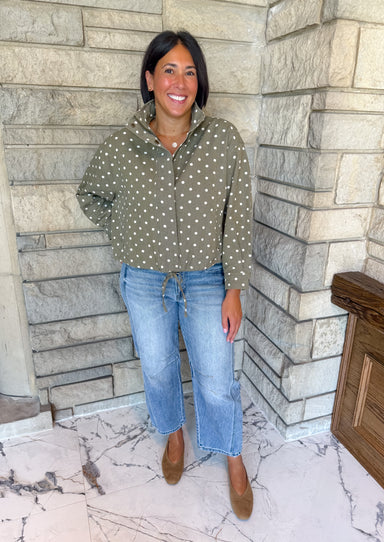 Olive green jacket with off white polka dots stand collar zipper front drawstring hem