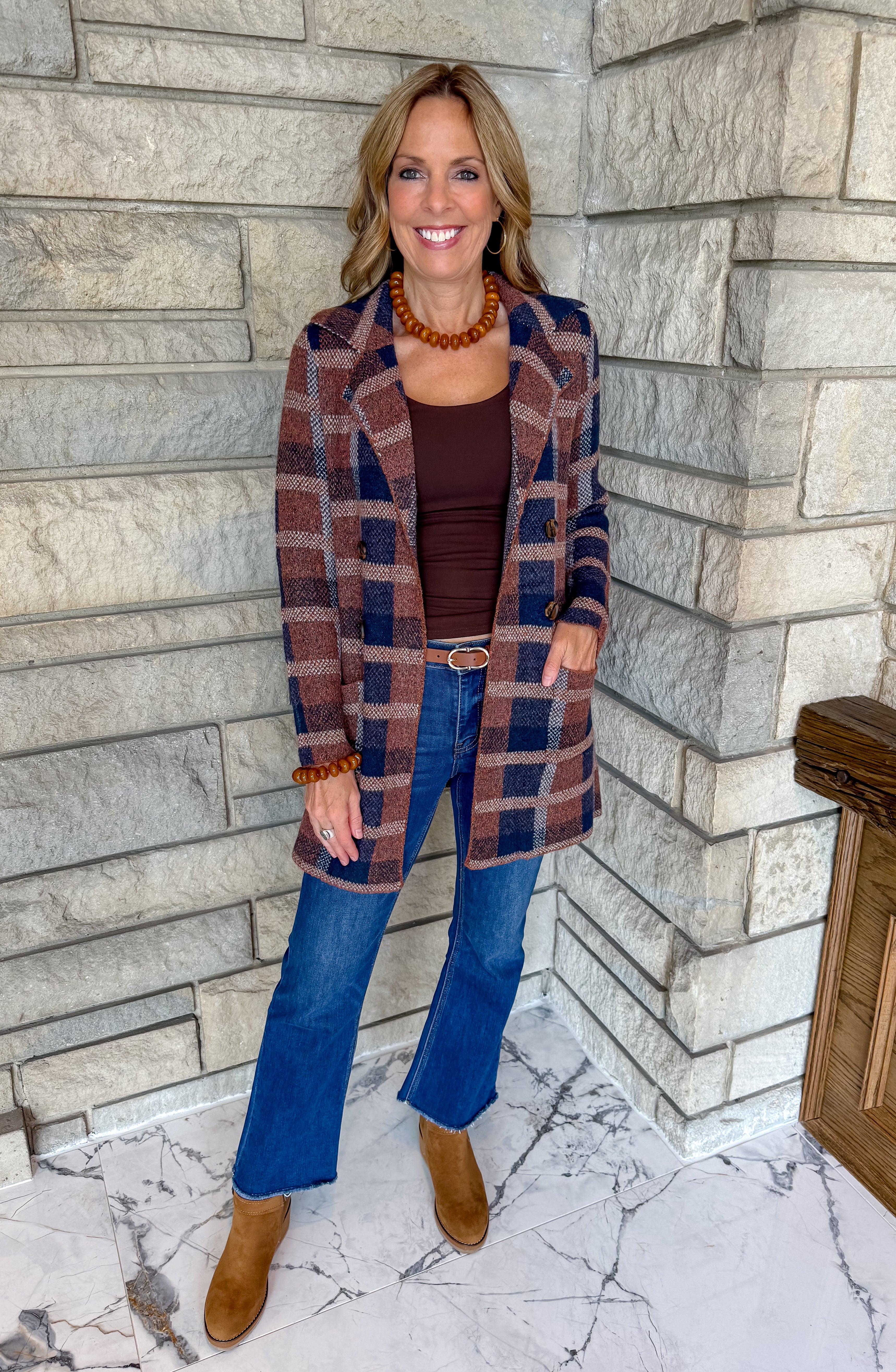 Navy and rust plaid long sweater coat collar lapel buttons and patch pockets