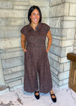 Brown with black mini leopard print jumpsuit with buttons and collar and wide legs and side cinched details