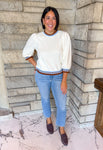 Cream top with brown and light blue striped ruffle collar, cuffs and hem, puff 3/4 sleeves