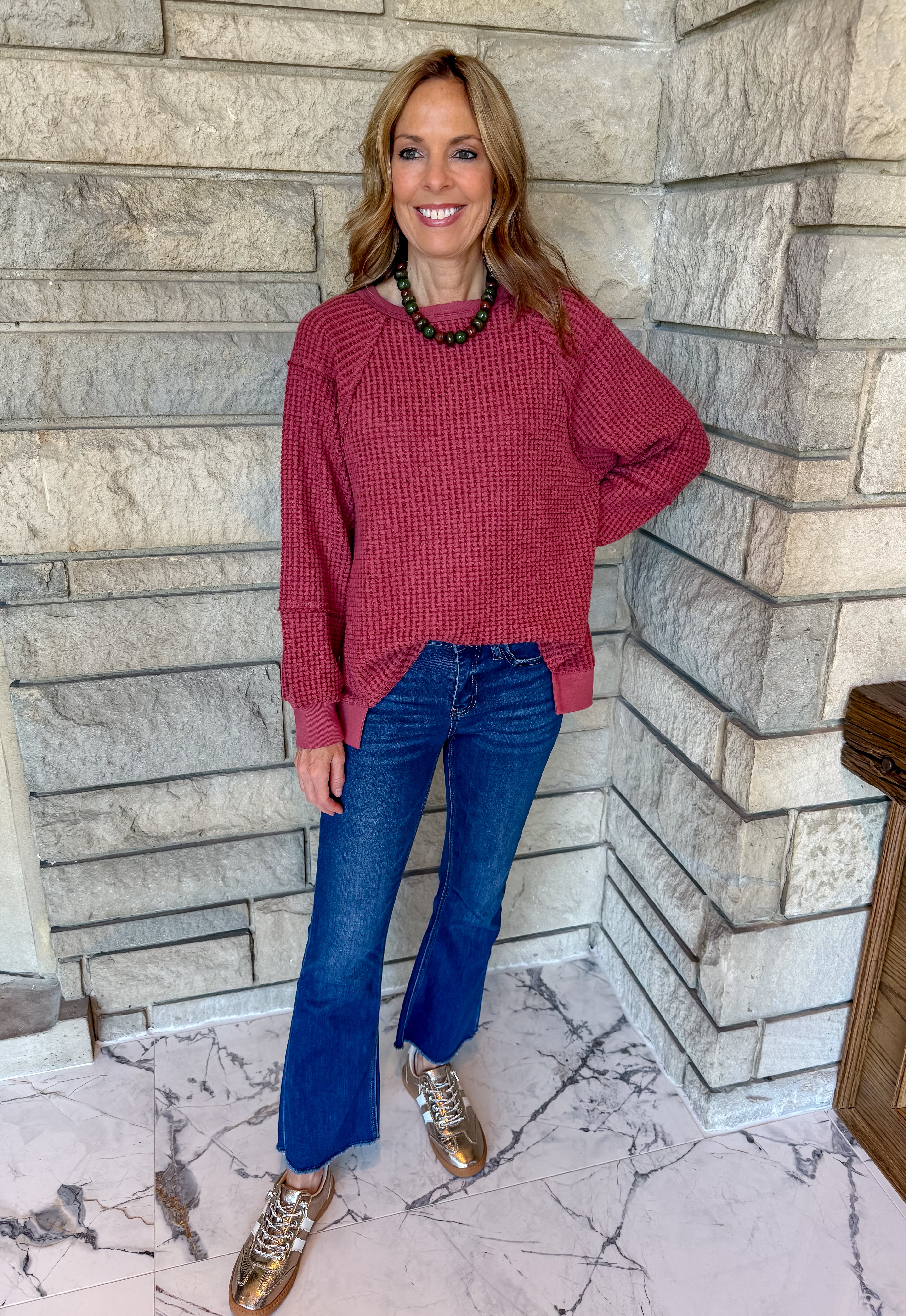 burgundy waffle long sleeve top banded cuff and split hem crew neck loose fit
