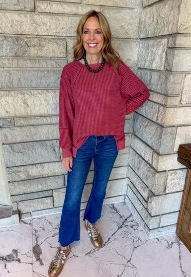 burgundy waffle long sleeve top banded cuff and split hem crew neck loose fit