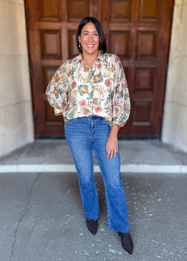 Collared
3/4 peasant sleeves
Lined
Ecru