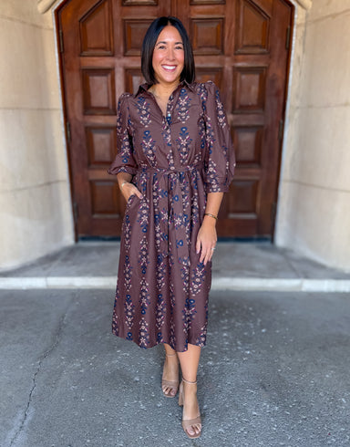Floral Print
Collared
3/4 Puff Sleeves
Band Cuff
Button Top
Belted Tie Waist
Side Pockets
Midi Length
Lined
Brown