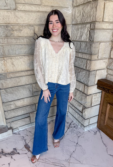 vintage inspired floral blouse
V neck embroidered floral top
Button front lace top