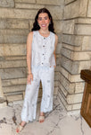 Eyelet sleeveless button top and wide leg pants set. 