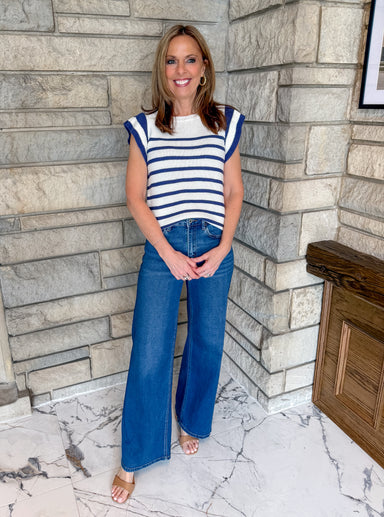 Ivory/Navy striped sleeveless ruffle top. Summer sweater with stripes and ruffles.