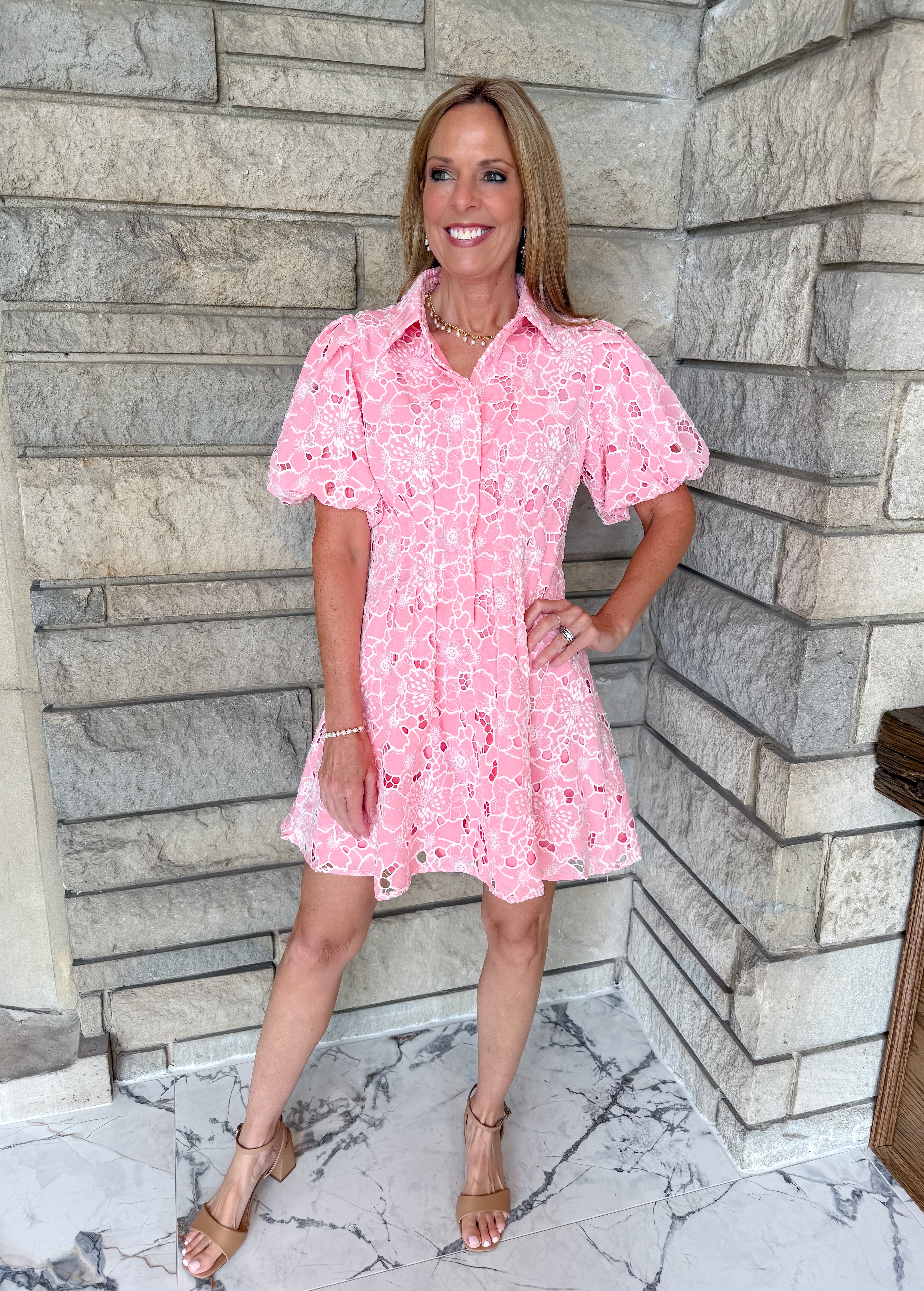 light pink dress with floral cutout
button down dress with bubble sleeves