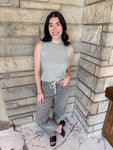 Heather grey tank top
eyelet and grommet detail on sleeve