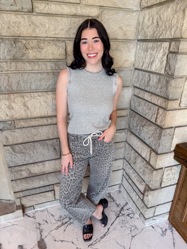 Heather grey tank top
eyelet and grommet detail on sleeve