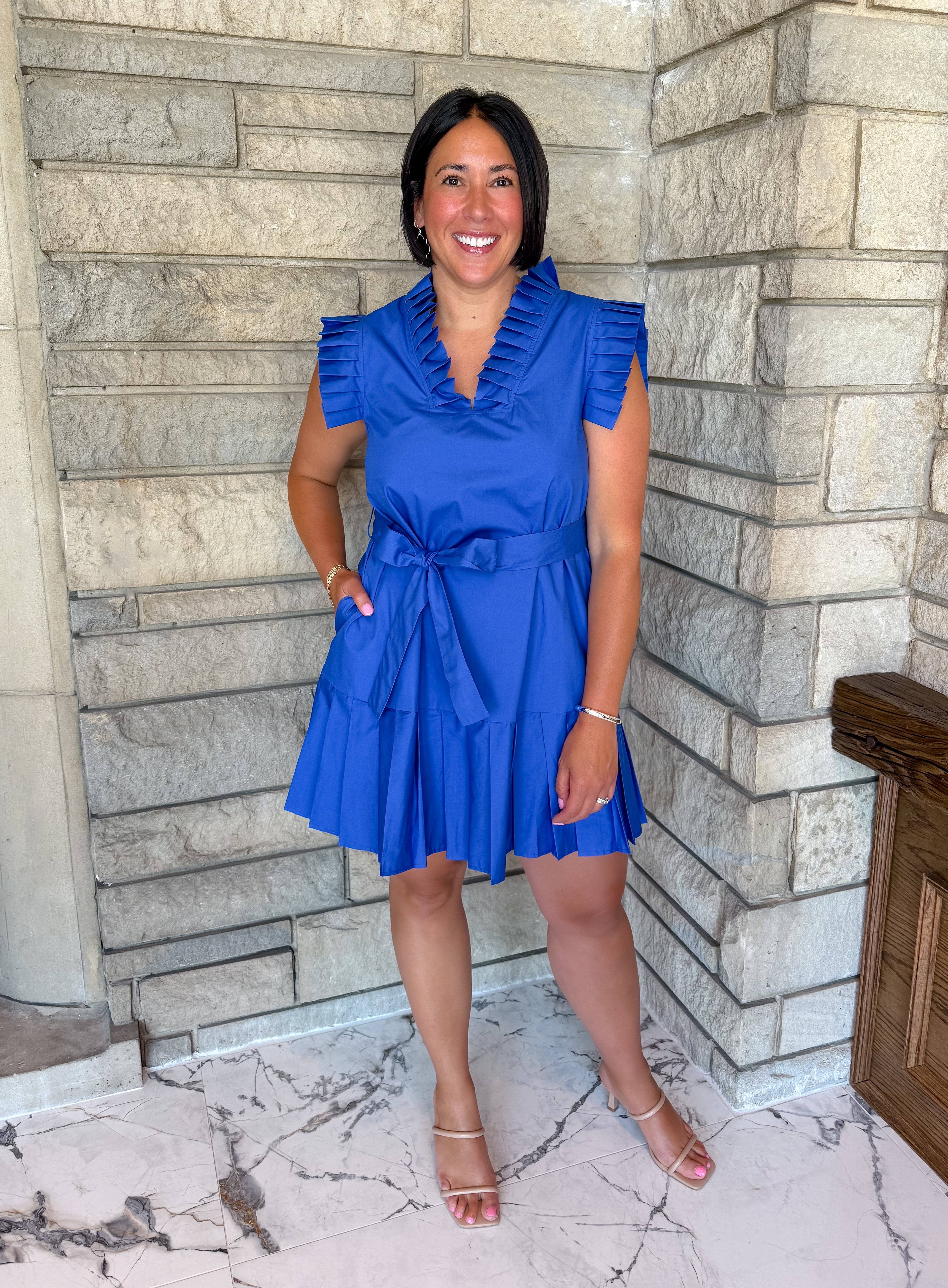 Royal blue dress
pleated sleeves and neckline
pleating on hem
belted waist