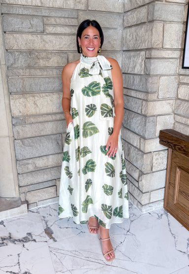 Ivory maxi dress with green leaf print
halter neck 
tie neck