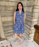 Royal blue gingham dress
white embroidered flowers
buttons