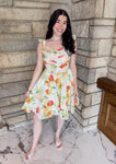 white dress with reds and orange and green flowers pintuck pleating ruffle sleeves