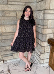 black mini floral print short dress with elastic smocking and tiers with mini ruffles