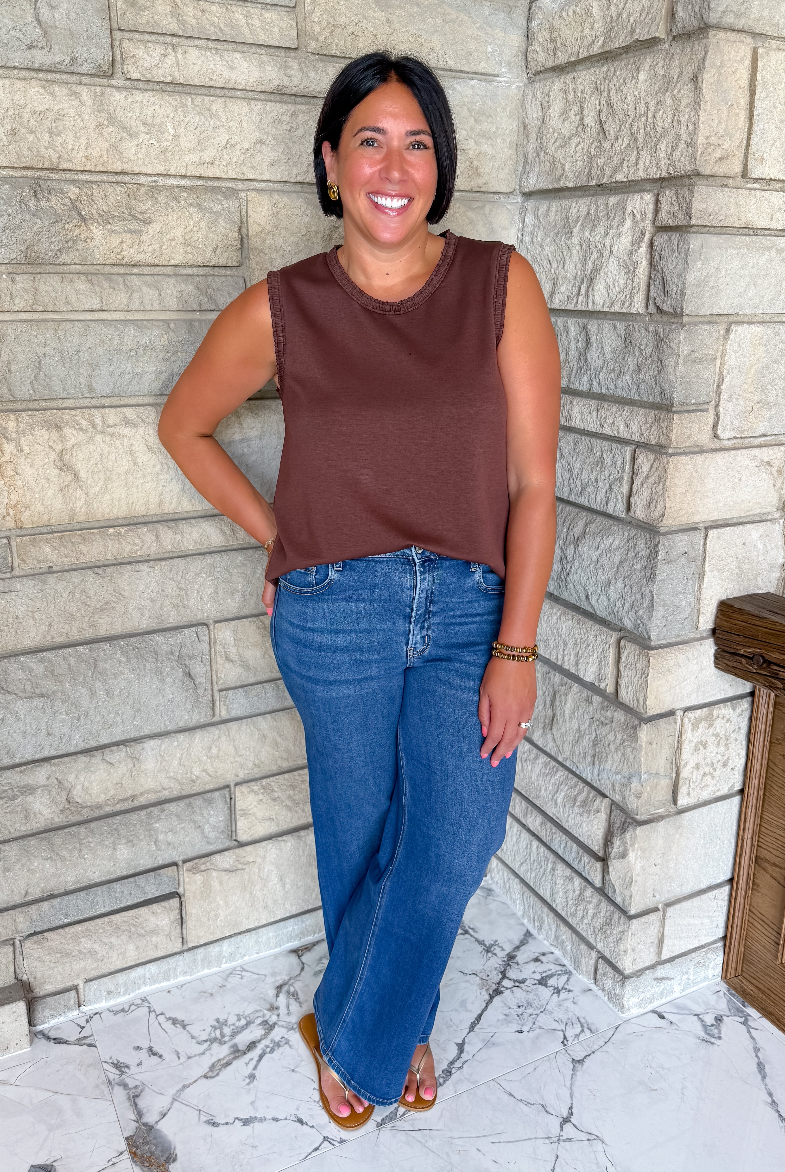 Brown sleeveless tank with smocked trim