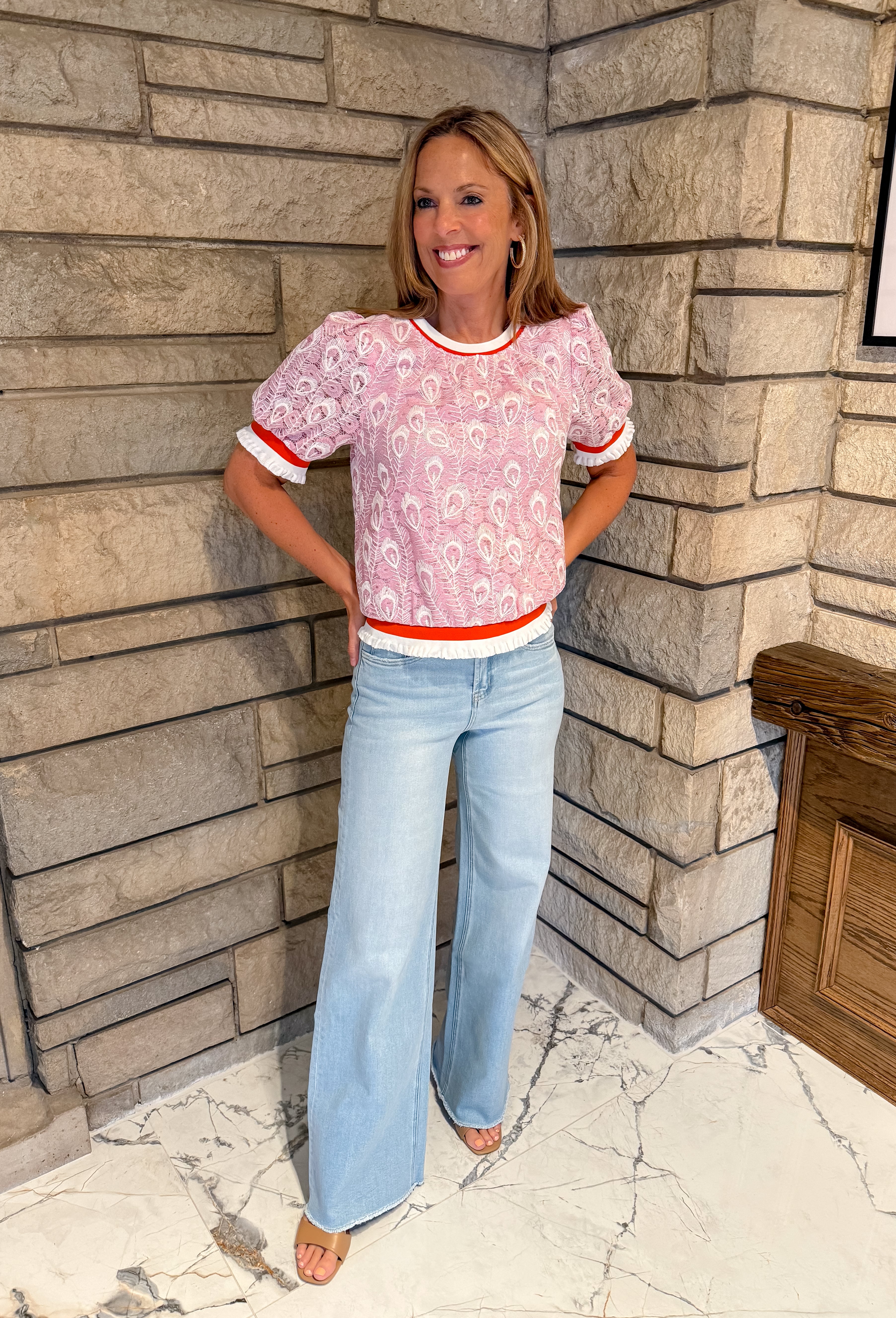 pink embroidered feather pattern short puff sleeves orange trim 