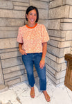 Orange textured woven floral pattern short bubble sleeve top