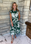 dark green dress with off white large floral print sleeveless buttons collar tie waist with grommets midi
