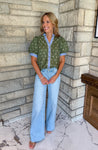 olive green puff sleeve top with ivory polka dots light blue trim buttons and cuffs